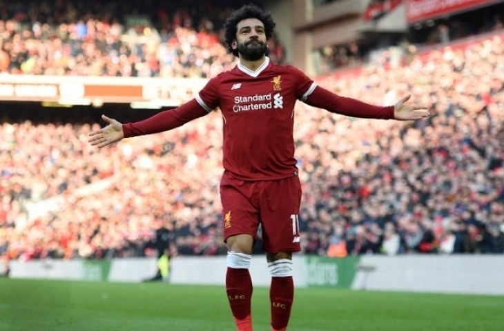 Pemain Liverpool Mohamed Salah merayakan golnya ke gawang West Ham United. Oli SCARFF / AFP