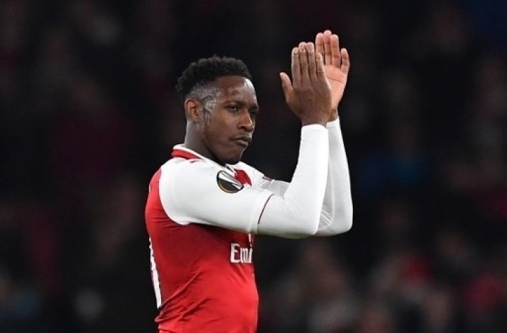 Striker Arsenal Danny Welbeck memberikan aplaus setelah membawa skuatnya mengalahkan AC Milan. Ben STANSALL / AFP 