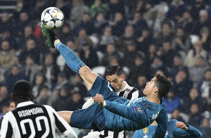 Cristiano Ronaldo mencetak gol saat Juventus vs Real Madrid (AFP)