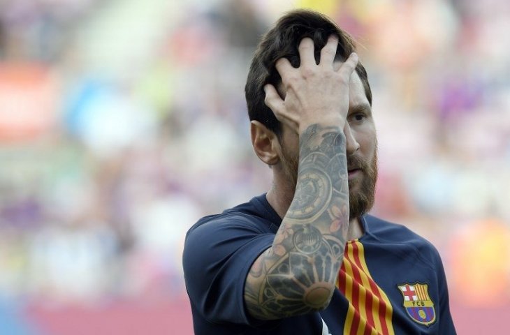 Kapten Barcelona, Lionel Messi (Lluis Gene/AFP)