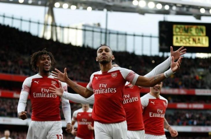 Selebrasi Arsenal ketika membobol gawang Tottenham. (Ian Kington/AFP).