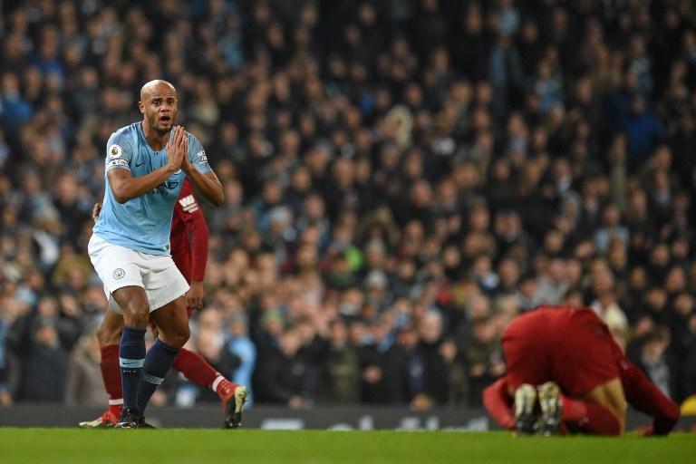 Reaksi Vincent Kompany usai menjatuhkan Mohamed Salah pada 3 Januari 2019 (Oli Scarff/AFP)