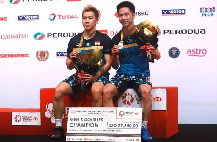 Pasangan ganda putra Indonesia Kevin Sanjaya Sukamuljo dan Marcus Fernaldi Gideon keluar sebagai juara Malaysia Masters 2019 usai menaklukan wakil Malaysia di partai final. [SADIQ ASYRAF / AFP]