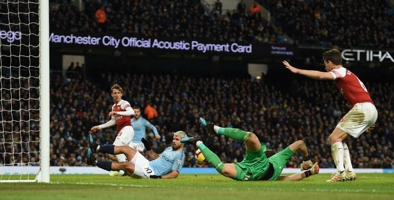 Momen Sergio Aguero mencetak gol ketiganya ke gawang Arsenal pada 3 Februari 2019 (Oli Scarff/AFP)