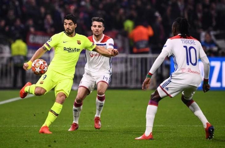 Aksi Luis Suarez saat laga melawan Lyon di Liga Champions pada 19 Februari 2019 (Franck Fife/AFP)