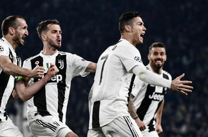 Para pemain Juventus merayakan gol Cristiano Ronaldo ke gawang Atletico Madrid pada leg kedua babak 16 besar Liga Champions (12/3/2019) [Marco Bertorello/AFP)