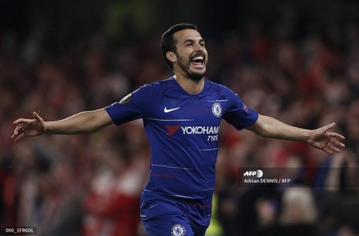 Penyerang Chelsea, Pedro merayakan golnya ke gawang Slavia. Padal laga leg kedua Liga Europa, Jumat (19/4/2019) dini hari tadi, Chelsea menang agregat 5-3 dan berhak lolos ke babak semifinal. [Adrian DENNIS / AFP]