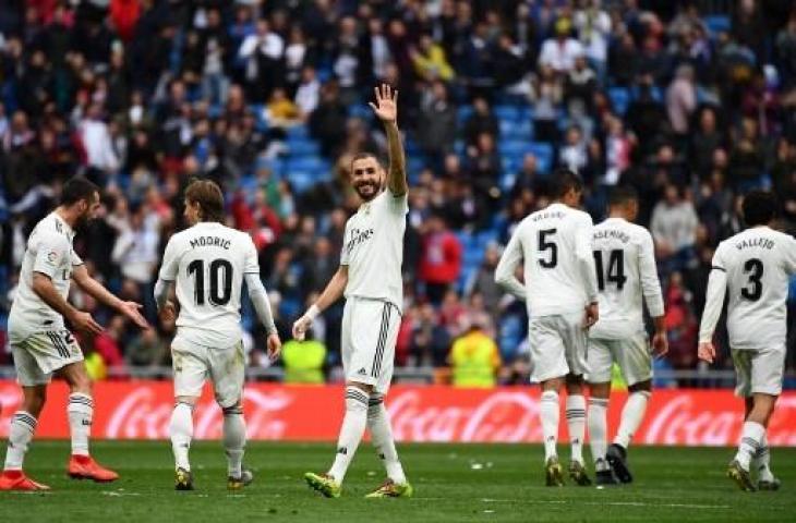 Karim Benzema sukses mencetak tiga gol kemenangan Real Madrid atas Athletic Bilbao dalam lanjutan La Liga Spanyol, Minggu (21/4/2019) malam WIB. (GABRIEL BOUYS / AFP)