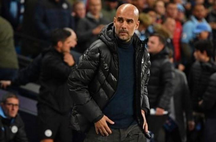 Pep Guardiola saat memimpin Manchester City melawan Dinamo Zagreb dalam laga Grup C Liga Champions. (ANTHONY DEVLIN / AFP)