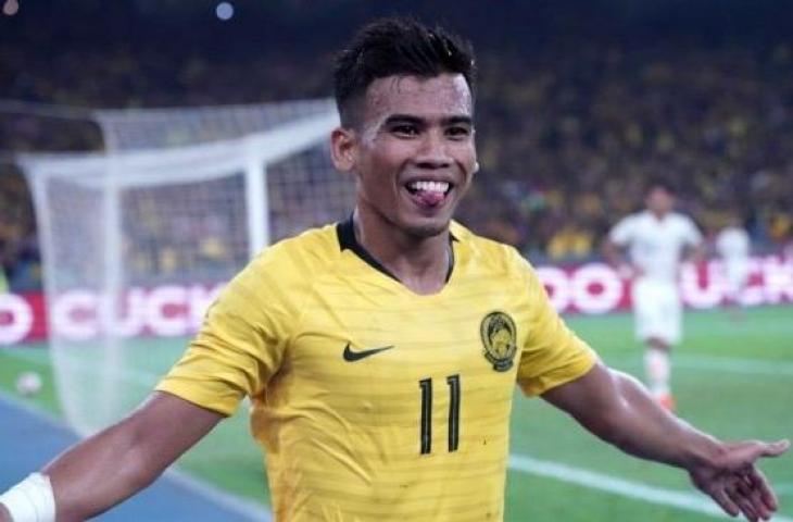 Ekspresi kegembiraan winger Timnas Malaysia, Safawa Rasid usai menjebol gawang Timnas Indonesia dalam laga lanjutan Kualifikasi Piala Dunia 2022 Zona Asia Grup G di Stadion Nasional Bukit Jalil, Kuala Lumpur, Selasa (19/11/2019) malam WIB. [KAMARUL AKHIR / AFP]