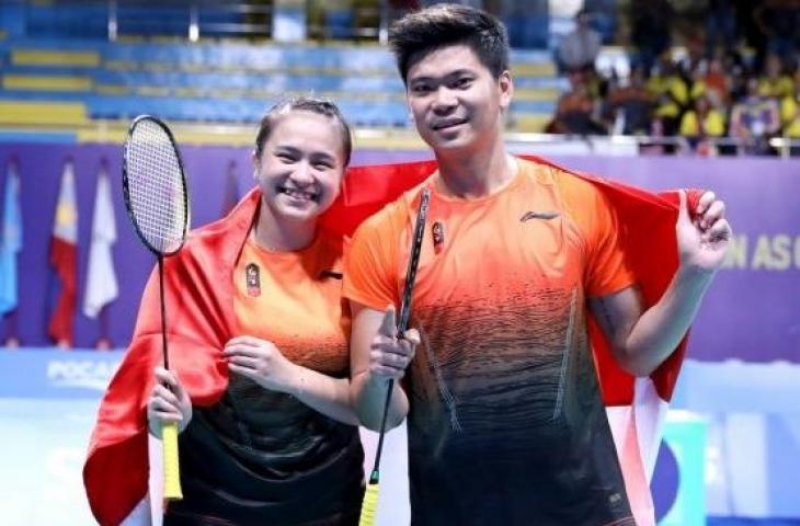 Pasangan ganda campuran Indonesia, Praveen Jordan/Melati Daeva Oktavianti, meraih medali emas SEA Games 2019 setelah di partai final mengalahkan wakil Malaysia, Goh Soon Huat/Lai Shevon Jemie, Senin (9/12). [Humas PBSI]