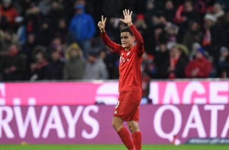 Girangnya Philippe Coutinho usai mencetak tiga gol ke gawang Werder Bremen. (CHRISTOF STACHE / AFP)