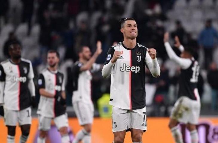 Selebrasi Cristiano Ronaldo dan kolega usai mengalahkan Parma 2-0. (MARCO BERTORELLO / AFP)