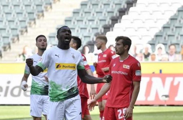 Penyerang Borussia Monchengladbach, Marcus Thuram. [MARTIN MEISSNER / POOL / AFP]