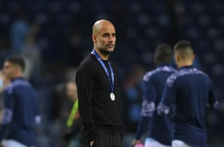 Wajah lesu Pep Guardiola usai gagal mengantar Manchester City juara Liga Champions. (DAVID RAMOS / AFP / POOL)