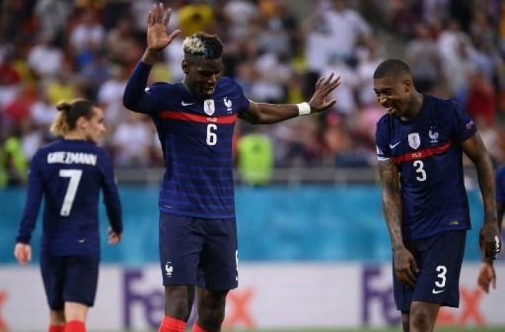 Gelandang Timnas Prancis, Paul Pogba, berselebrasi usai menjebol gawang Swiss. (Franck Fife/AFP)