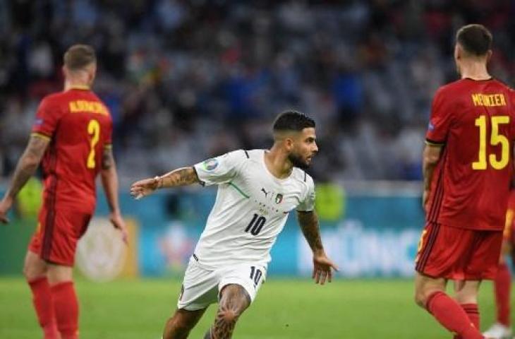 Selebrasi striker Italia, Lorenzo Insigne usai membobol gawang Belgia. (CHRISTOF STACHE / POOL / AFP)