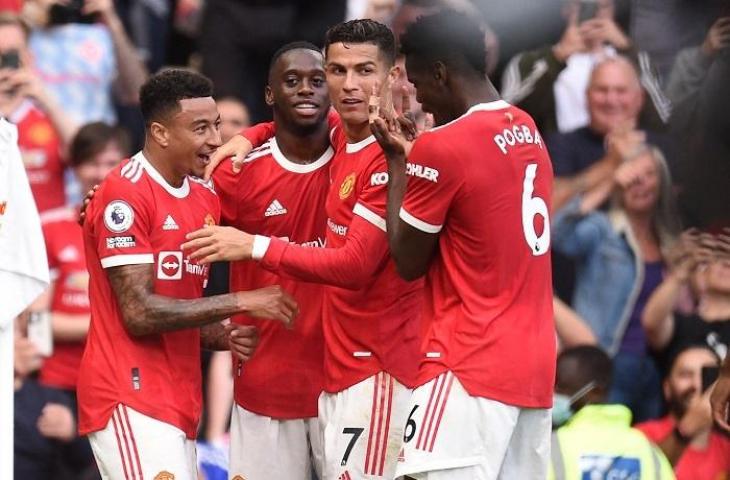 Jesse Lingard, Cristiano Ronaldo, Paul Pogba merayakan gol usai laga MU vs Newscastle United. (AFP/Oli Scarff)