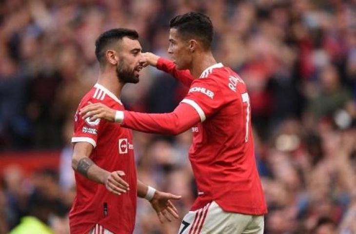 Bruno Fernandes dan Cristiano Ronaldo. (Oli SCARFF / AFP)