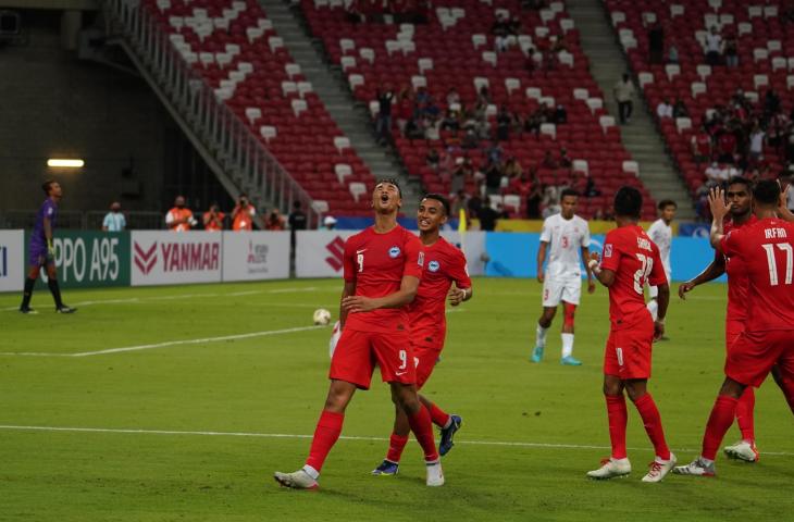 Striker Timnas Singapura, Ikhsan Fandi, berselebrasi usai menjebol gawang Myanmar pada laga pembuka Piala AFF 2020, Minggu (6/12/2021). (Dok. AFF)