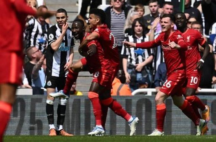 Naby Keita merayakan golnya saat Liverpool tundukkan Newcastle United 1-0. (PAUL ELLIS / AFP)