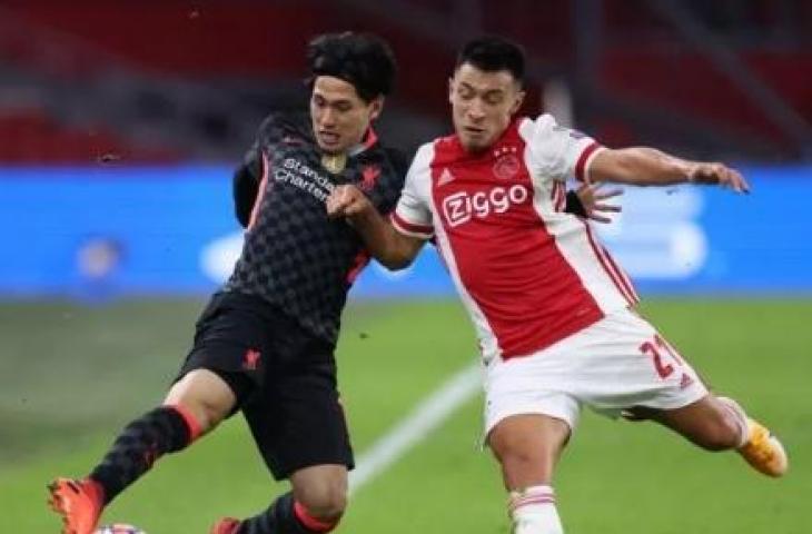 Bek Ajax, Lisandro Martinez (kanan). [KENZO TRIBOUILLARD / AFP]