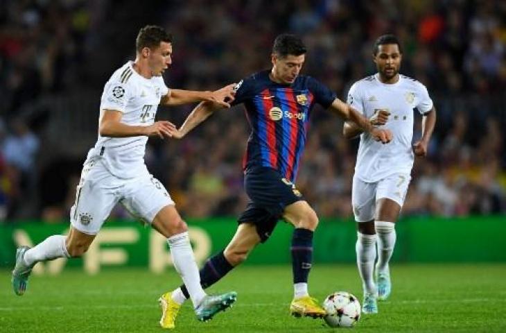 Aksi Robert Lewandowski saat Barcelona dihajar Bayern Munich 0-3 dalam lanjutan Liga Champions 2022/2023. (AFP)