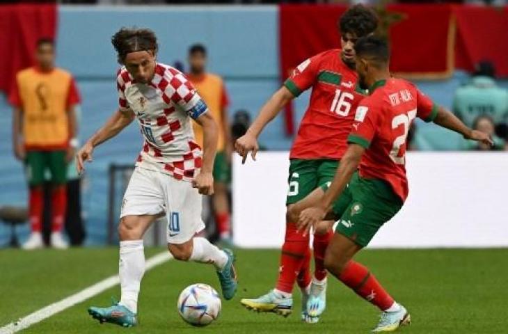 Aksi Luka Modric saat Kroasia ditahan imbang Maroko 0-0 di Piala Dunia 2022. (AFP)