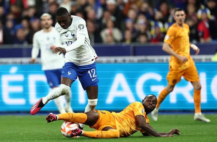 Striker Timnas Prancis, Kolo Muani, dalam laga melawan Belanda di Kualifikasi Euro 2024 pada 24 Maret 2023. (AFP/Anne-Christine P)