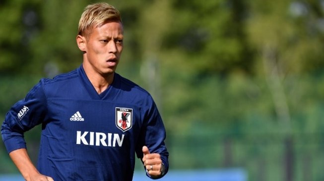 Attacker Timnas Jepang, Keisukes Honda (SAEED KHAN / AFP)