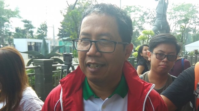 Wakil Ketua Umum PSSI ,Joko Driyono, di kawasan Stadion Utama Gelora Bung Karno (SUGBK), Senayan, Jakarta, Minggu (22/7/2018). (Suara.com/Arief Apriadi) 