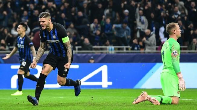 Ekpresi Mauro Icardi usai menjebol gawang Barcelona dalam pertandingan lanjutan Liga Champion grup B, Rabu (7/11/2018) dini hari. (Miguel MEDINA / AFP)