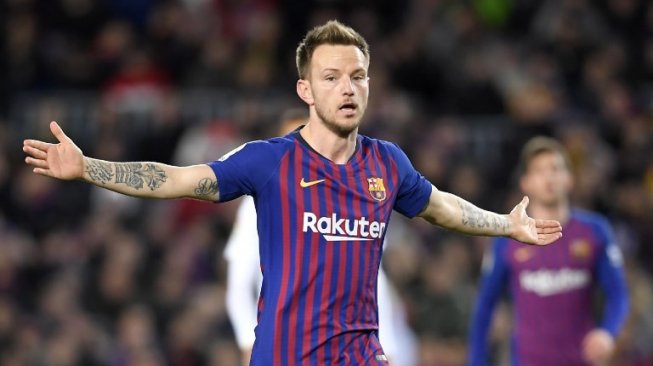 Gelandang sentral Barcelona, Ivan Rakitic. [LLUIS GENE / AFP]