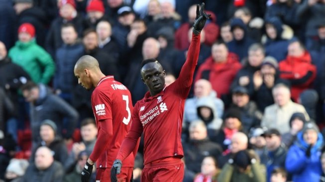 Penyerang Liverpool, Sadio Mane, mencetak dua dari empat gol Liverpool ke gawang Burnley di Anfield, Minggu (10/3/2019). Laga ini berakhir dengan skor 4-2 untuk kemenangan Liverpool. [AFP/Paul Ellis]