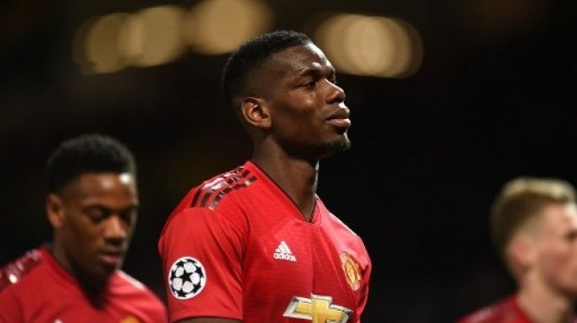 Reaksi gelandang Manchester United Paul Pogba dan pemain MU lainnya setelah dikalahkan Barcelona Barcelona di leg pertama perempat final Liga Champions di Old Trafford. Oli SCARFF / AFP