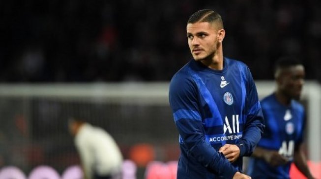 Striker Paris Saint-Germain Mauro Icardi saat bersiap menghadapi Real Madrid di Parc des Princes stadium pada ajang Liga Champions. MARTIN BUREAU / AFP