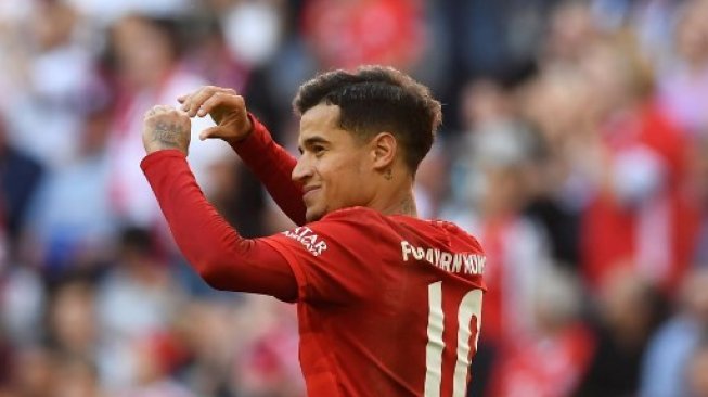 Aksi gelandang serang Bayern Munchen, Philippe Coutinho pada pertandingan melawan FC Koln pekan lalu. (CHRISTOF STACHE / AFP)