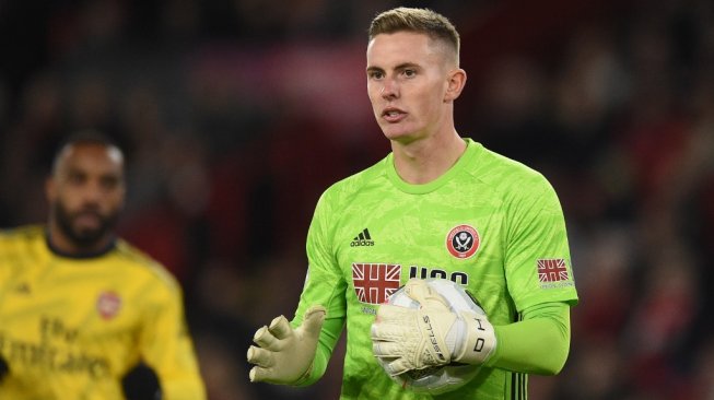 Kiper Sheffield United, Dean Henderson. [OLI SCARFF / AFP]