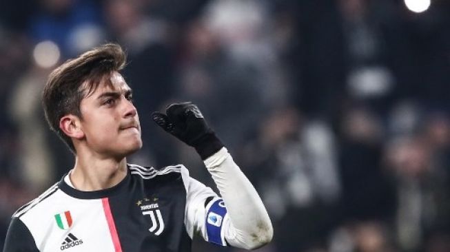 Striker Juventus Paulo Dybala merayakan golnya ke gawang Udinese dari titik penalti di babak 16 besar Coppa Italia di Turin. Isabella BONOTTO / AFP