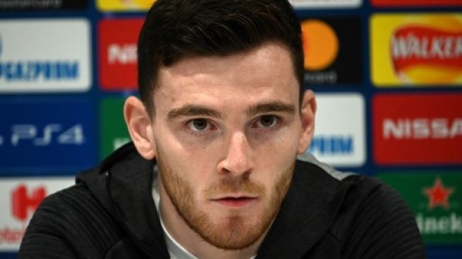 Pemain Liverpool Andrew Robertson hadiri jumpa pers jelang laga leg kedua babak 16 besar Liga Champions kontra Atletico Madrid, Selasa (10/3/2020). [AFP]