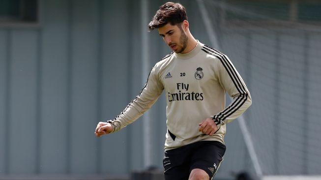 Winger Real Madrid, Marco Asensio berlatih di pusat latihan klub, Ciudad del Real Madrid di Valdebebas, Madrid, Spanyol. [Laman resmi Real Madrid]