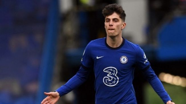 Gelandang Chelsea Kai Havertz merayakan golnya ke gawang Fulham dalam lanjutan Liga Inggris di Stamford Bridge, London. NEIL HALL / POOL / AFP