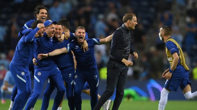 Selebrasi pelatih asal Jerman Thomas Tuchel usai mengantarkan Chelsea juara Liga Champions. (Foto: DAVID RAMOS/AFP)