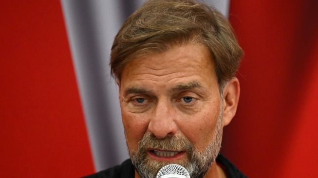 Manajer Liverpool, Jurgen Klopp menghadiri konferensi pers jelang laga pramusim kontra Manchester United di Rajamangala Stadium, Bangkok, Thailand. [Manan VATSYAYANA / AFP]